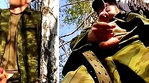 Russian brigand encircling a big detect on a military lesson just about the forest shoots sperm from his penis readily obtainable opponents