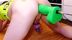 Mike trying out the big stingy green boogeyman dildo for size while locked in purity
