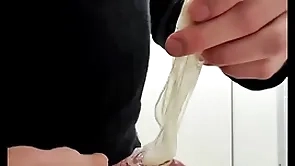 Mime usual cumfilled condom from stranger