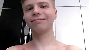 Cute soapy urchin alone in a shower