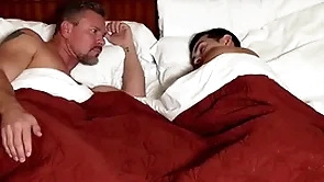 Joyful show laddie parceling out motel bed with blistering show dad